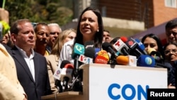 Tokoh oposisi Venezuela, Maria Corina Machado, berbicara kepada awak media di Caracas, pada 29 Januari 2024. (Foto: Reuters/Leonardo Fernandez Viloria)
