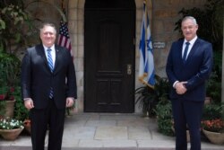 U.S. Secretary of State Mike Pompeo, left, meets Israeli Blue and White party leader Benny Gantz in Jerusalem, May 13, 2020.