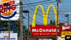 FILE - This Sept. 21, 2005, file photo shows a series of fast food restaurants near Saco, Maine. (AP Photo/Pat Wellenbach, File)