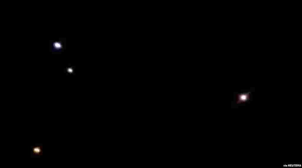 What are said to be missiles are seen after Iran attacked at least two Iraqi air bases hosting U.S.-led coalition forces in this still image taken from video released by state-run Iran Press on Jan. 8, 2020.