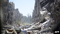 Kehancuran di kamp pengungsi Palestina Yarmouk dekat ibukota Damaskus, Suriah (6/4). 