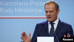 Perdana Menteri Polandia Donald Tusk berbicara di Warsawa 