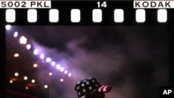 This was Robert Cohen's Kodachrome shot of the audience at the state fair tractor pull. Pretty good for 14-year-old film.
