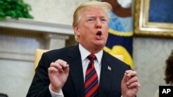 Presiden AS Donald Trump berbicara di Gedung Putih, hari Selasa (22/5). 