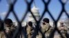 National Guard keep watch on the Capitol, Thursday, March 4, 2021, on Capitol Hill in Washington. Capitol Police say they have uncovered intelligence of a "possible plot" by a militia group to breach the U.S. Capitol on Thursday, nearly two months…