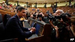 FILE - Spain's Prime Minister Pedro Sanchez is photographed at the Spanish parliament in Madrid, Feb. 13, 2019. 