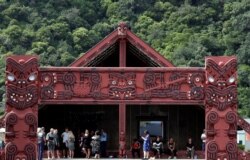 Relatives wait for the rescue mission at Mataatua Mare house, following the White Island volcano eruption in Whakatane, New Zealand, Dec. 13, 2019.