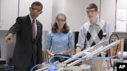 President Barack Obama and students at Thomas Jefferson High School in Virginia, Sept. 16, 2011.