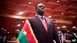 Burkina Faso's transitional president Michel Kafando attends the official handover ceremony returning him to office in Ouagadougou, Burkina Faso, Sept. 23, 2015.
