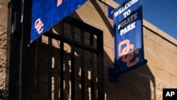 Pictures of the Altobelli family are shown at the entrance of the Orange Coast College baseball stadium, Jan. 28. 2020.