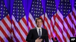 Democratic presidential candidate South Bend, Ind. Mayor Pete Buttigieg reacts to applause after delivering a Veterans Day address during a campaign event in Rochester, N.H., Nov. 11, 2019.