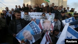 팔레스타인 가자지구에서 팔레스타인인들이 도널드 트럼프 미국 대통령의 중동평화구상에 항의하는 시위를 하고 있다. 