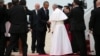 President Barack Obama greets Pope Francis upon his arrival at Joint Base Andrews, Md., Sept. 22, 2015.