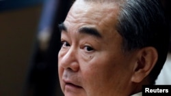 Menteri Luar Negeri China Wang Yi saat menghadiri perayaan 50 tahun ASEAN Regional Forum di Manila, Filipina, 8 Agustus 2017. 