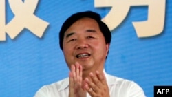 FILE - This picture taken on July 11, 2013 shows the then-mayor of the Chinese city of Nanjing, Ji Jianye, attending a groundbreaking ceremony for Nanjing Yangtze River International Shipping and Logistics Service Center.