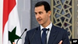 Presiden Suriah Bashar Assad berbicara di Damaskus (foto: dok). 