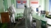 Offices at the Phyongchon District People's Hospital are disinfected to help curb the spread of the coronavirus, April 1, 2020, in Pyongyang, North Korea.