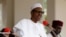 FILE - Nigerian President Muhammadu Buhari speaks at the presidential villa in Abuja, Nigeria. The state rolled out an online recruitment tool, N-Power, this month and said it will hire half a million university graduates to work across the country in various sectors.