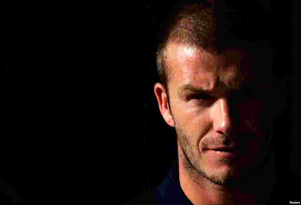 David Beckham pada sebuah konferensi pers di Sydney, 2007. Ia mengumumkan pengunduran diri dari sepakbola profesional pada 16 Mei 2013. (Reuters/Mick Tsikas)