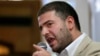 Osama Morsi, son of ousted Egyptian President Mohamed Morsi, speaks during a press conference in Cairo, July 22, 2013. 