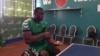 George Wyndham practices table tennis at the National Stadium in Freetown, Sierra Leone, March 12, 2016. (N. deVries/ VOA news)