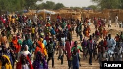 FILE - Displaced people are seen in a camp in Diffa, Niger, June 18, 2016.