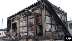 A burned commercial structure is pictured in Maputo, Mozambique, Dec. 24, 2024. More than 6,000 prisoners escaped from a prison near Maputo the next day, amid unrest triggered by confirmation of the Frelimo party as the winner of recent elections.