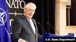 U.S. Secretary of State Rex Tillerson delivers remarks during a press availability at NATO in Brussels, Belgium, Dec. 6, 2017. Tillerson said the United States is convinced the incidents harming the health of U.S. Embassy workers in Cuba were "targeted attacks."
