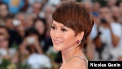 FILE - Chinese singer and actress Tan Weiwei at the Venice Film Festival, Sept. 12, 2009.