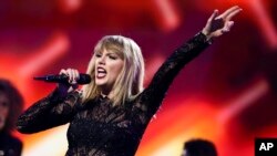 FILE - Taylor Swift performs at DIRECTV NOW Super Saturday Night Concert at Club Nomadic on Feb. 4, 2017 in Houston, Texas. 