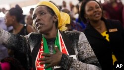 Kenyans participate in Sunday church service with President Uhuru Kenyatta present in Nairobi, Aug. 6, 2017. 