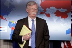 National security adviser John Bolton listens during a press briefing at the White House, Jan. 28, 2019, in Washington. (AP Photo/ Evan Vucci)