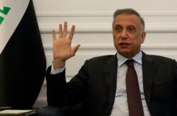 Iraqi Prime Minister Mustafa al-Kadhimi speaks during an interview with The Associated Press in Baghdad, Iraq, Aug. 17, 2020.