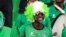 A Nigeria supporter cheers prior to the Group D Africa Cup of Nations (CAN) 2021 football match between Nigeria and Sudan at Stade Roumde Adjia in Garoua, Jan. 15, 2022.