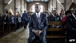 Ramazani Shadary dans la cathédral Nord-Dame du Congo à Kinshasa, le 24 novembre 2018.