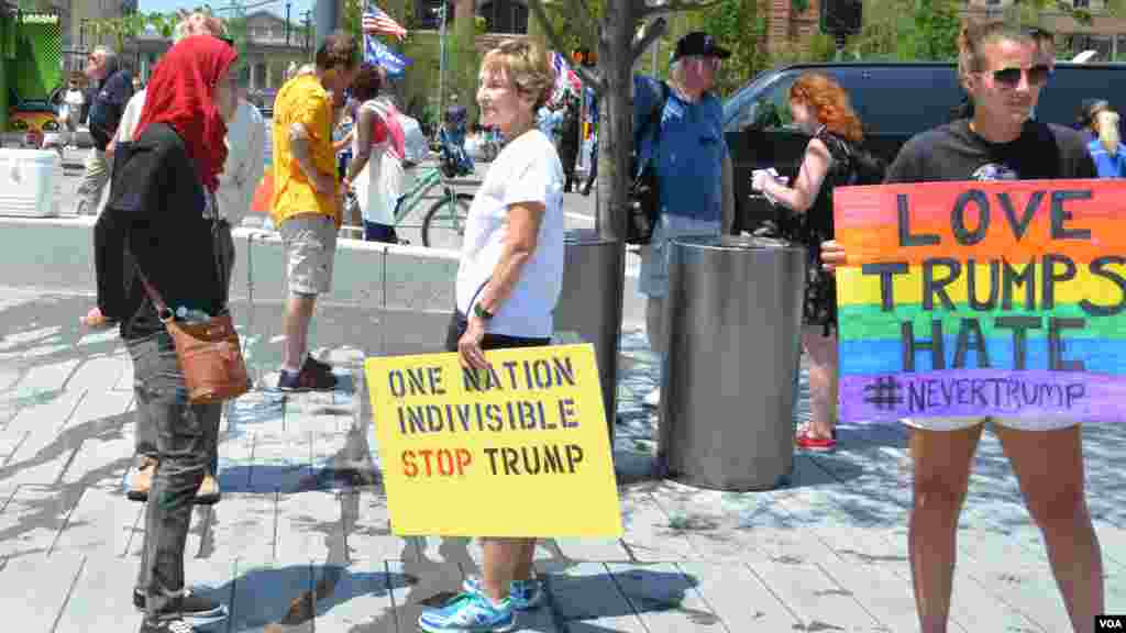 Women protesting Republican presidential candidate Donald Trump stand outside the RNC (July 19, 2016).
