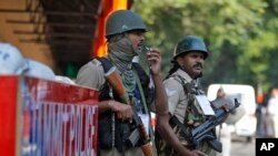 Indian security personnel guard outside the civil secretariat of the Union territory of Jammu and Kashmir during the annual reopening of the former state's winter capital in Jammu, India, Nov. 4, 2019. 