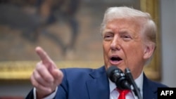 Predsednik Donald Tramp odgovara na pitanja novinara u Bijeloj kući (Foto: AFP/Oberto Schmidt)