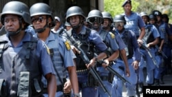 Riot police patrol the campus ahead of student protests demanding free education at Johannesburg's University of the Witwatersrand, South Africa, October 11,2016.