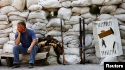 Guillaume Rolland oo u dhashay dalka France, oo ku dul socda fiilo aad u dhuuban, kana qeyb galaya tartan caqli ka bax ah oo ka dhacaya magaalada Moleson, ee dalka Switzerland.