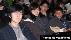 Chinese and international students attend a conference in Beijing in 2011.