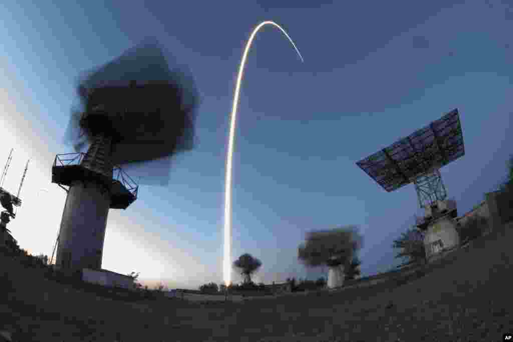 In this photo taken with long time exposure the Soyuz-FG rocket booster with the Soyuz MS-05 space ship carrying a new crew to the International Space Station, ISS, blasts off at the Russian-leased Baikonur cosmodrome, Kazakhstan.