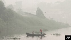 A worker adjusts lanterns for upcoming celebration of Buddha&#39;s birthday at Jogye temple in Seoul, South Korea.