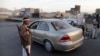 Shi'ite Houthi rebels man a checkpoint in Sana'a, Yemen, Sept. 27, 2014. 