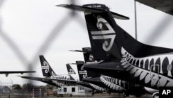 FILE - Air New Zealand planes sit idle on the tarmac at Christchurch Airport, New Zealand, April 6, 2020. As part of its efforts to counter the spread of the coronavirus the country has closed its borders to non-residents until 2022.