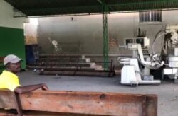 A man sits on a bench in the orthopedics waiting room at the General Hospital in Port-au-Prince. (Matiado Vilme/VOA Creole)