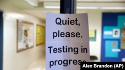 SAT administrators said they cancelled the exam because some students had gained access to test materials.