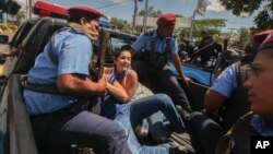 Police detain protesters in Managua, Nicaragua, March 16, 2019.