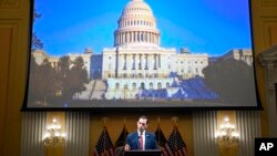 Rep. Jason Crow, D-Colo., speaks as members of Congress share recollections of the Jan. 6, 2021, assault on the U.S. Capitol on the one-year anniversary of the attack, Jan. 6, 2022.