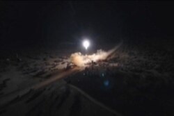 An image grab from video obtained from the state-run Iran Press news agency allegedly shows rockets launched by Iran against U.S. military bases in in Iraq, Jan. 8, 2020.